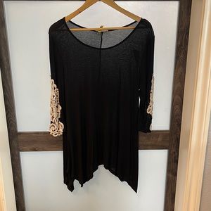 Black longer tops. Cute detailed sleeves.